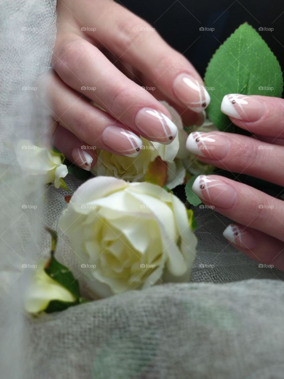 French manicure with a delicate rose scent