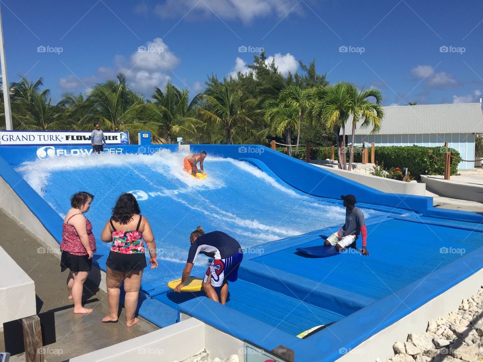 Wave pool surfing