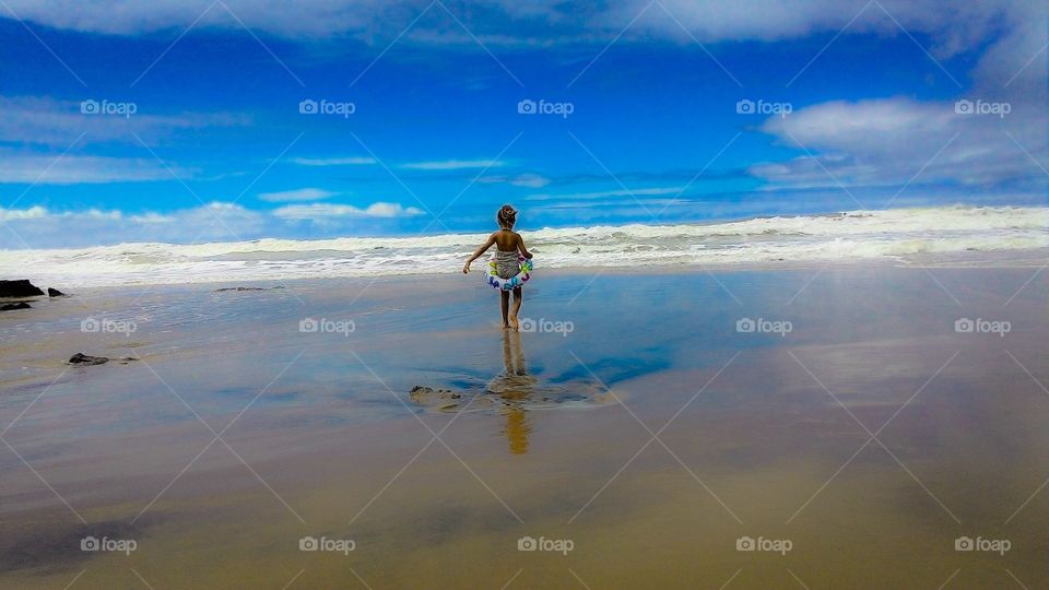 Child on a beach paradise