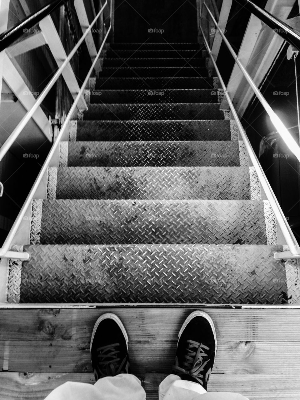 Step down 2. Stairs in a ferry named mirambeena. Black and white.