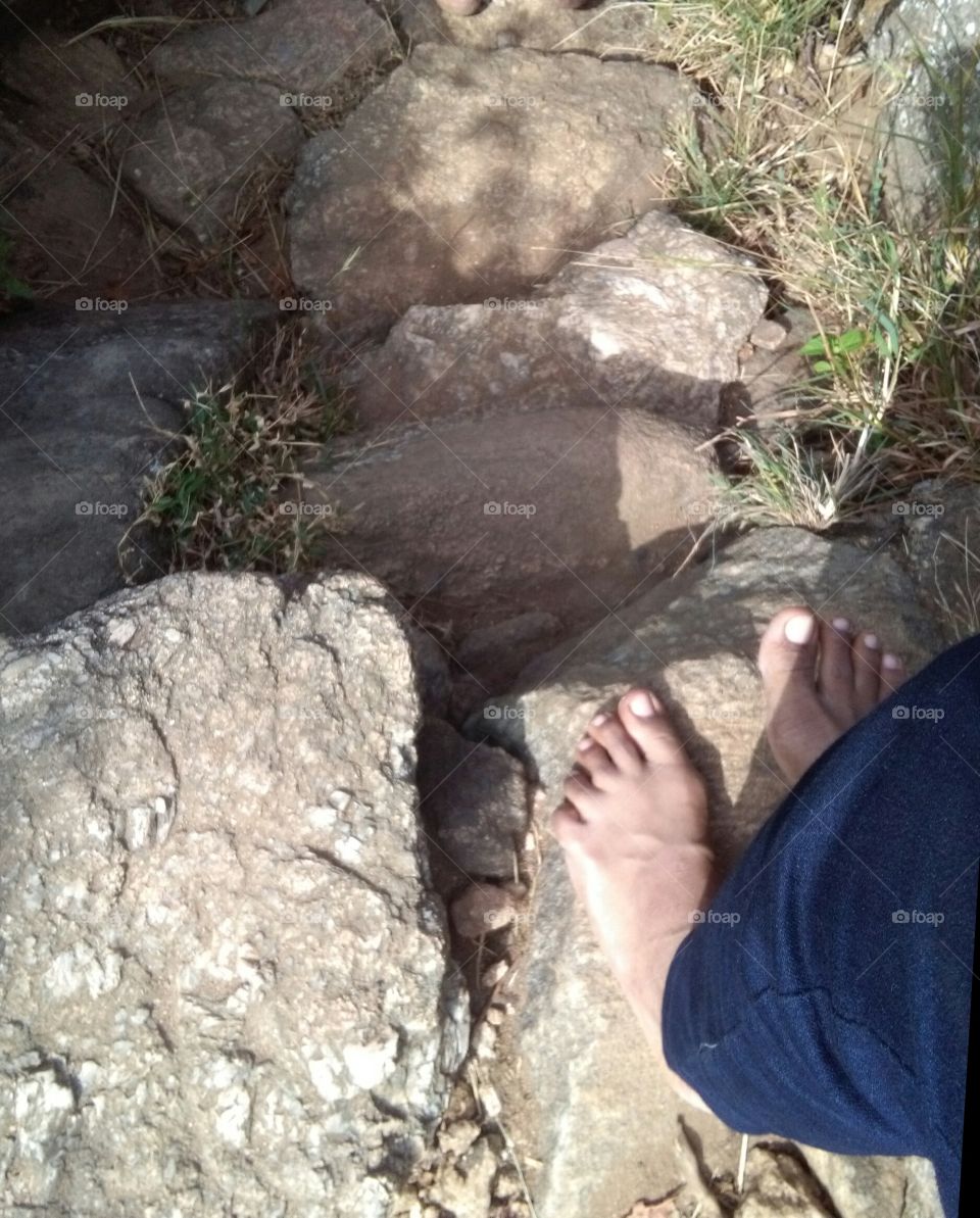 Foot in stone