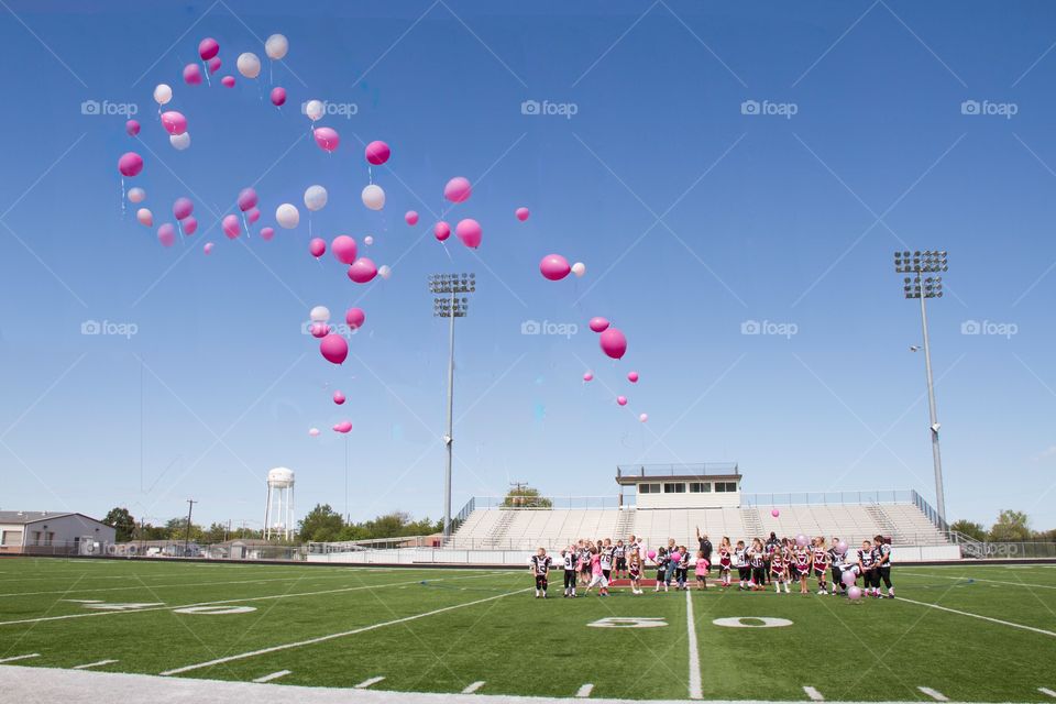 Pink ribbon balloon release. Breast cancer awareness balloon release 