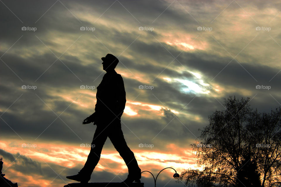 Man's silhouette at sunset