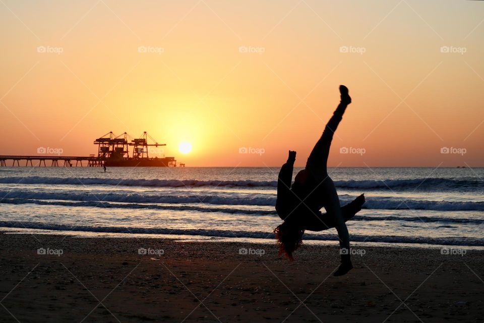 Flip on the beach during sunset 
