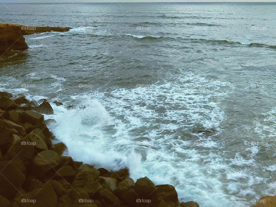 Water splashing on rock