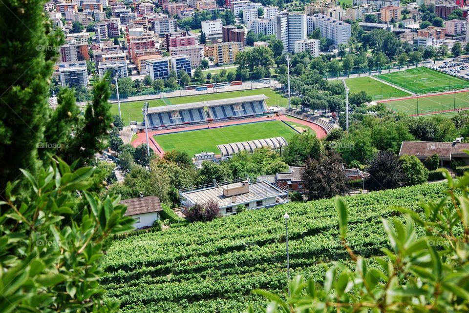 Football field under the vineyard, view from Porza - Lugano, Canton Ticino, Switzerland.