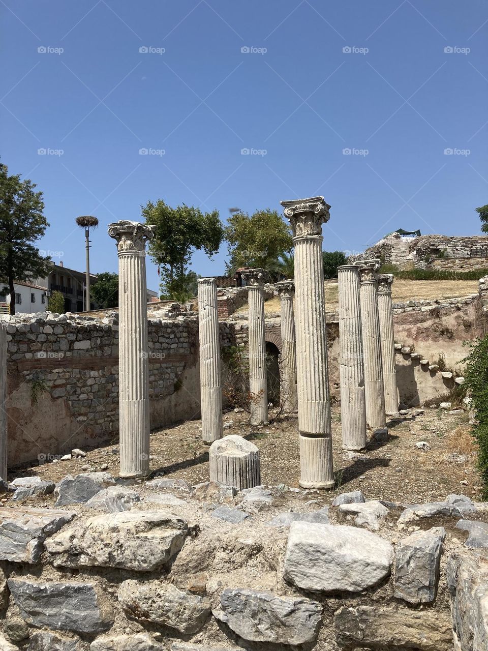 Ancient ruins. Sunny holidays I’m Turkey. Walk in the cute city and charming streets by the beach in Kusadasi. perfect blue sky and ocean view. Beach and the shore. To travel is to live. Gorgeous tall palm trees.