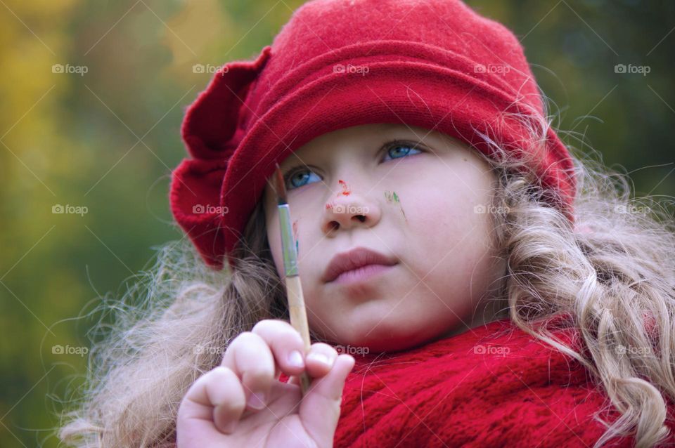 girl draws a beautiful picture