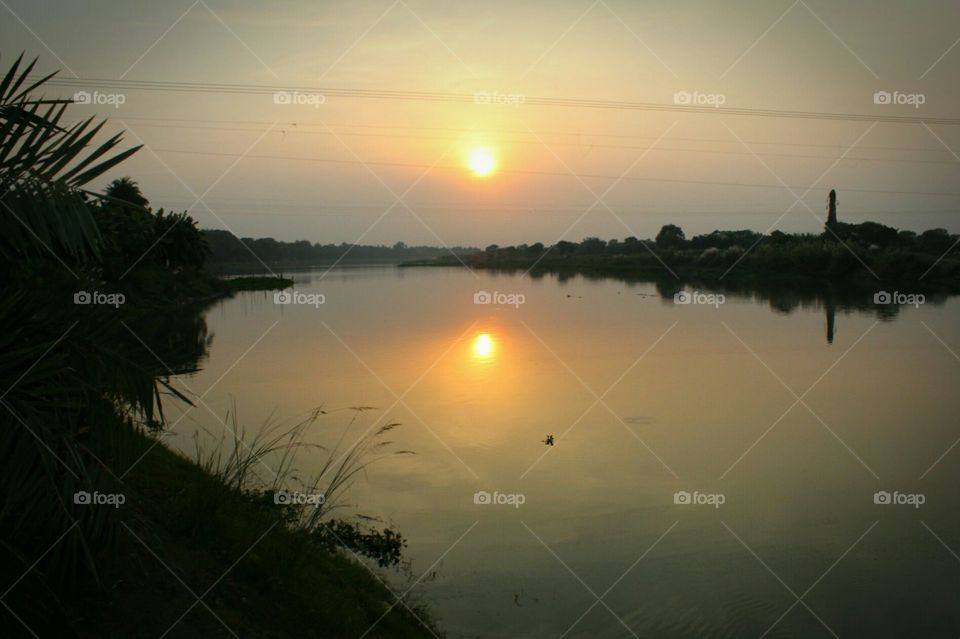 sunset at the river Jalangi
