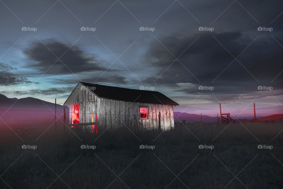 Super spooky shack at sunset looking haunted and scary for Halloween. 