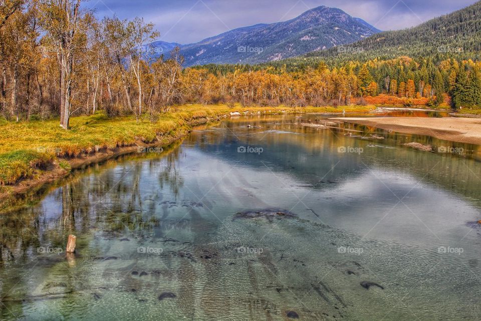 View of idyllic lake and mountains