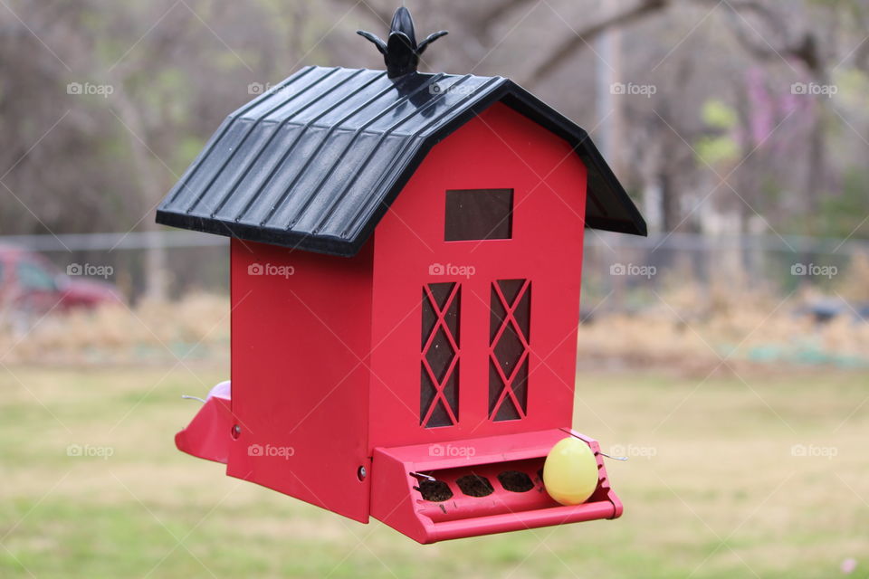 Red Barn Bird Feeder Hiding Easter Egg