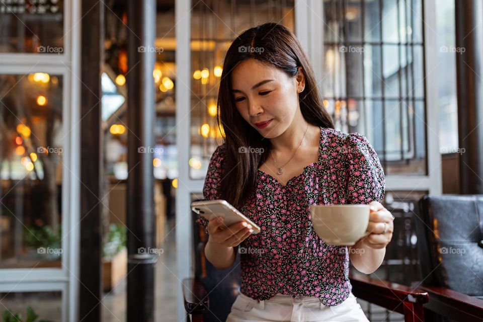 Woman using mobile phone 