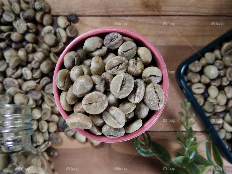 top view of coffee beans on wooden table