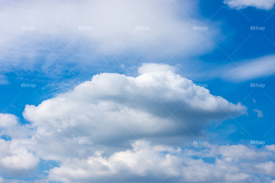 The beauty of the sky with clouds and the sun.