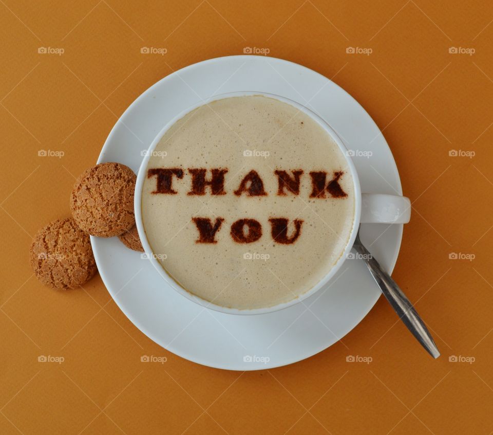 Thank you. Thanks expressed as a message written in chocolate powder on the froth of a cup of coffee with biscuits #2