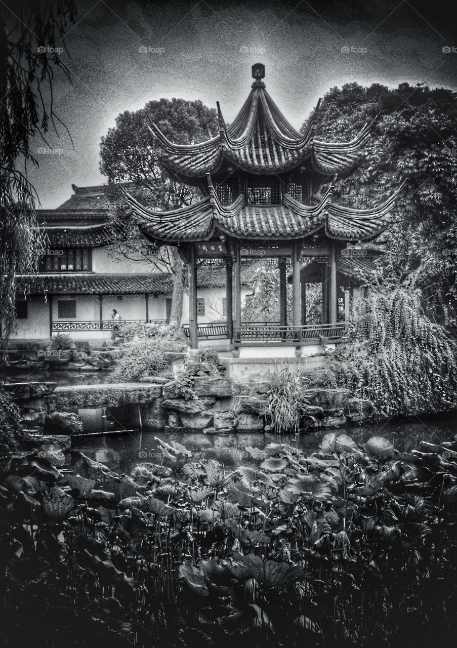 Suzhou gazebo in a public park carries the legacy of traditional Chinese architecture 