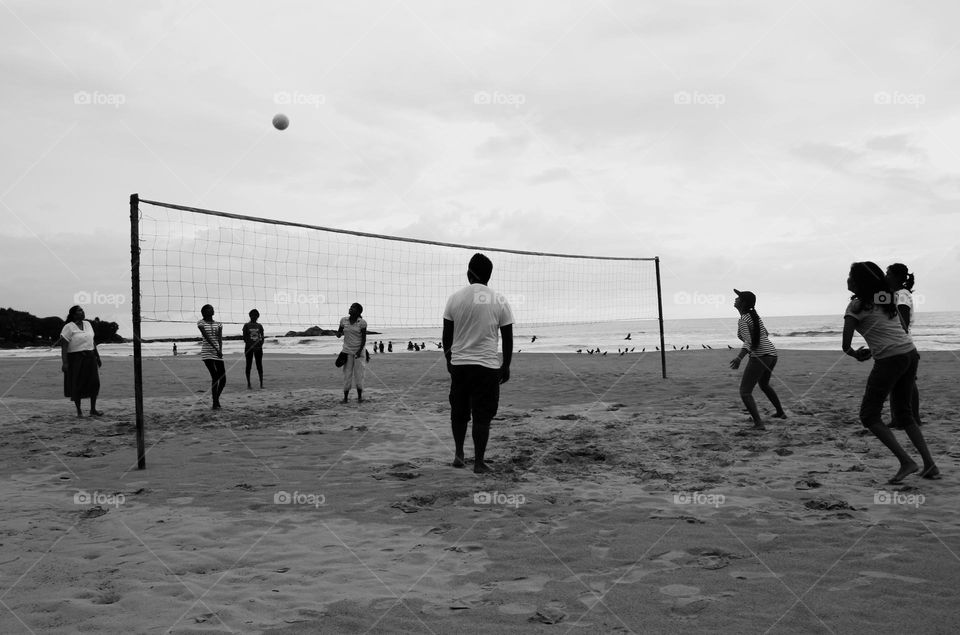 playing volleyball