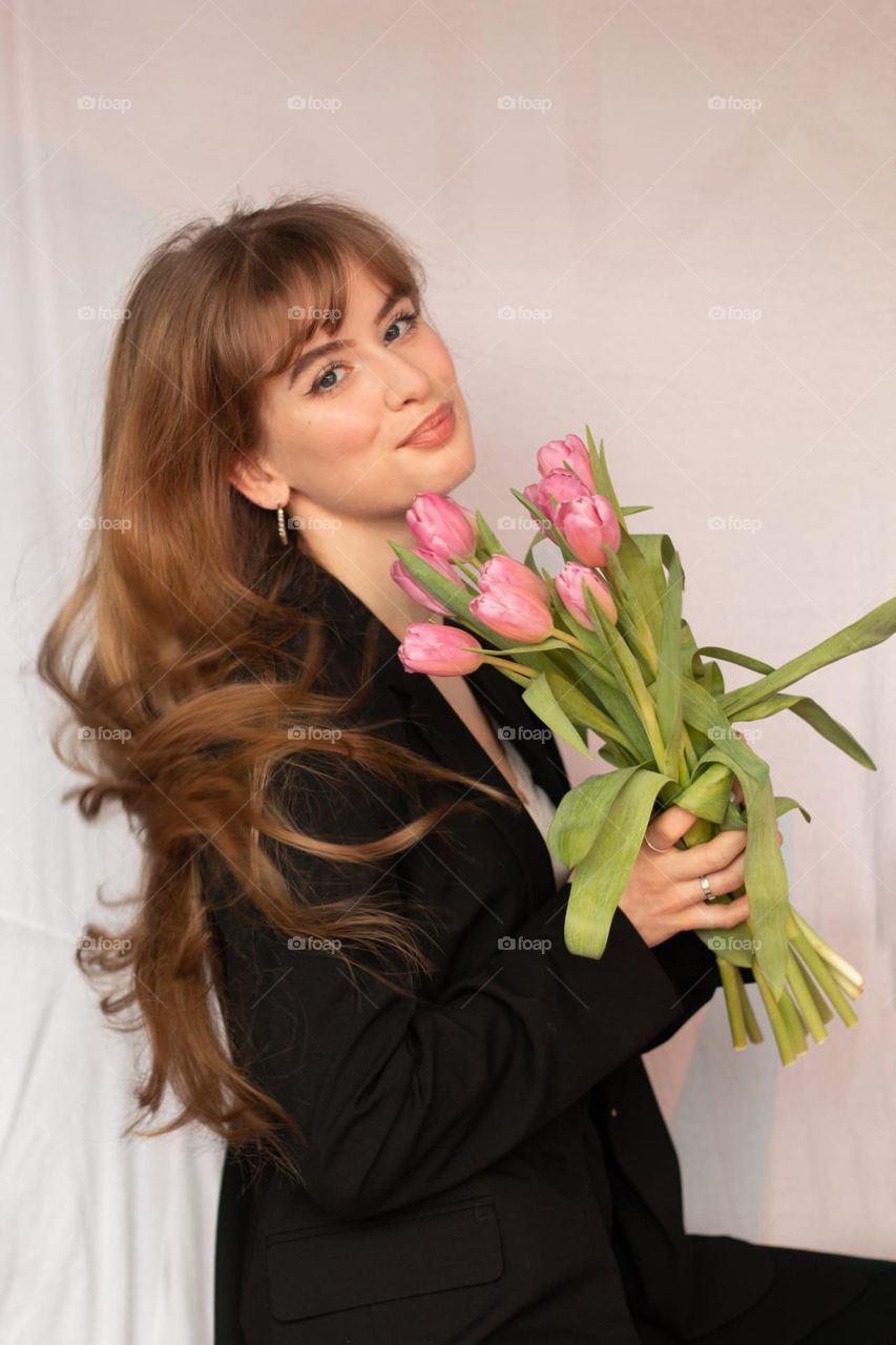 Young lady loves flowers