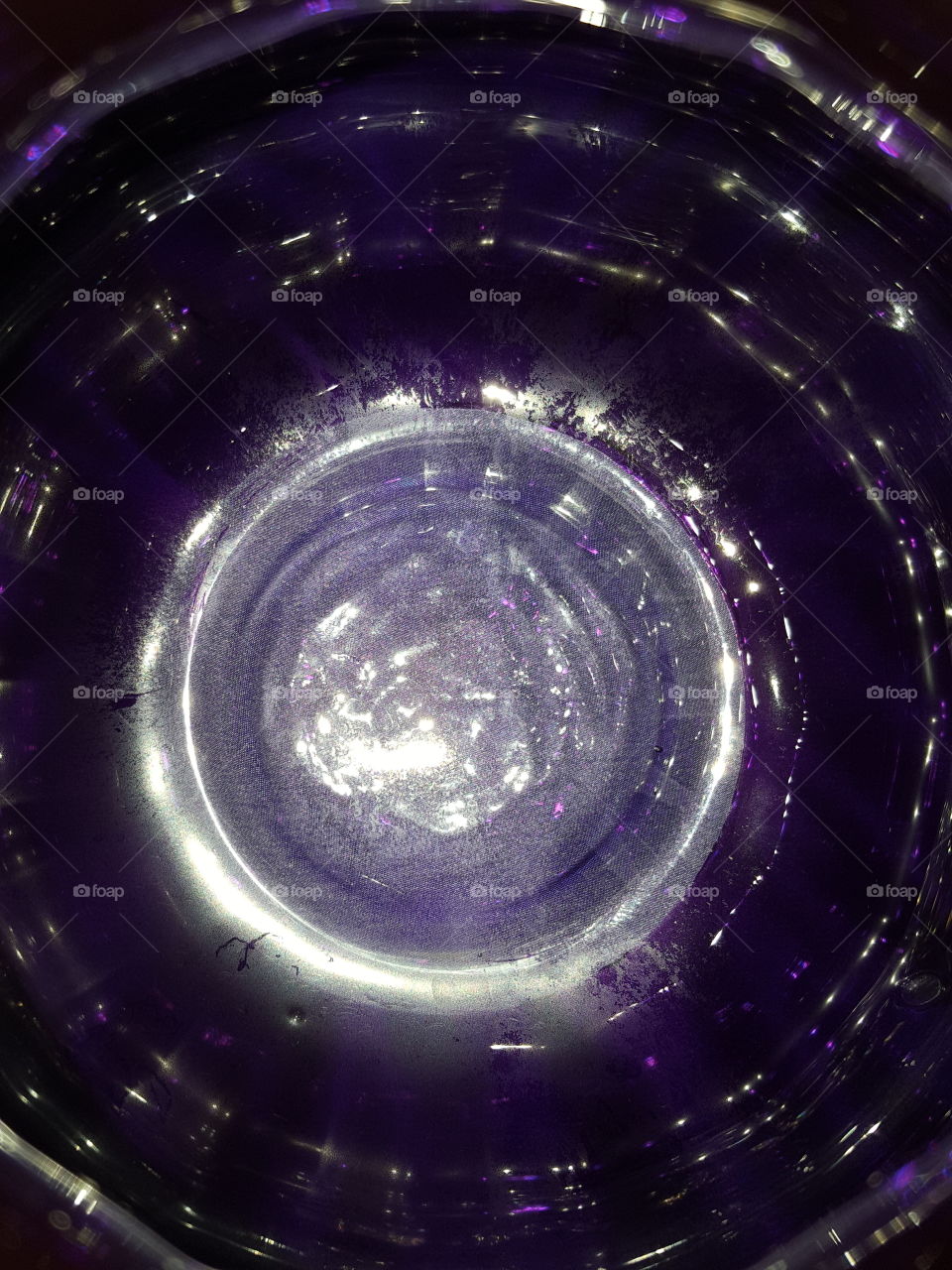 inside the purple glass vase