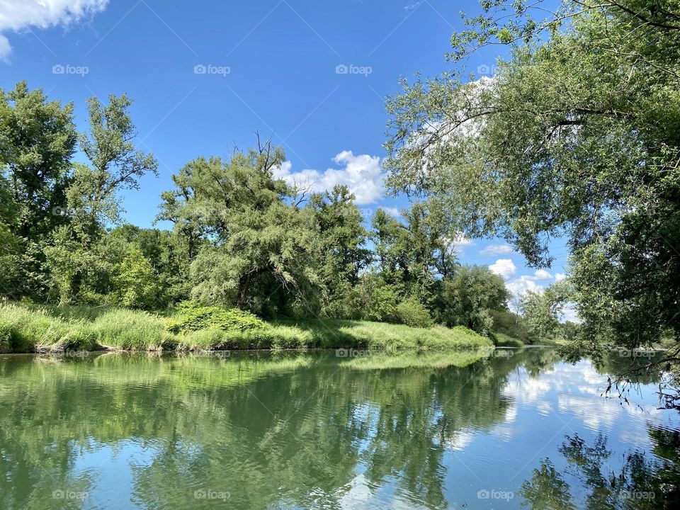 water landscape grass and clouds 