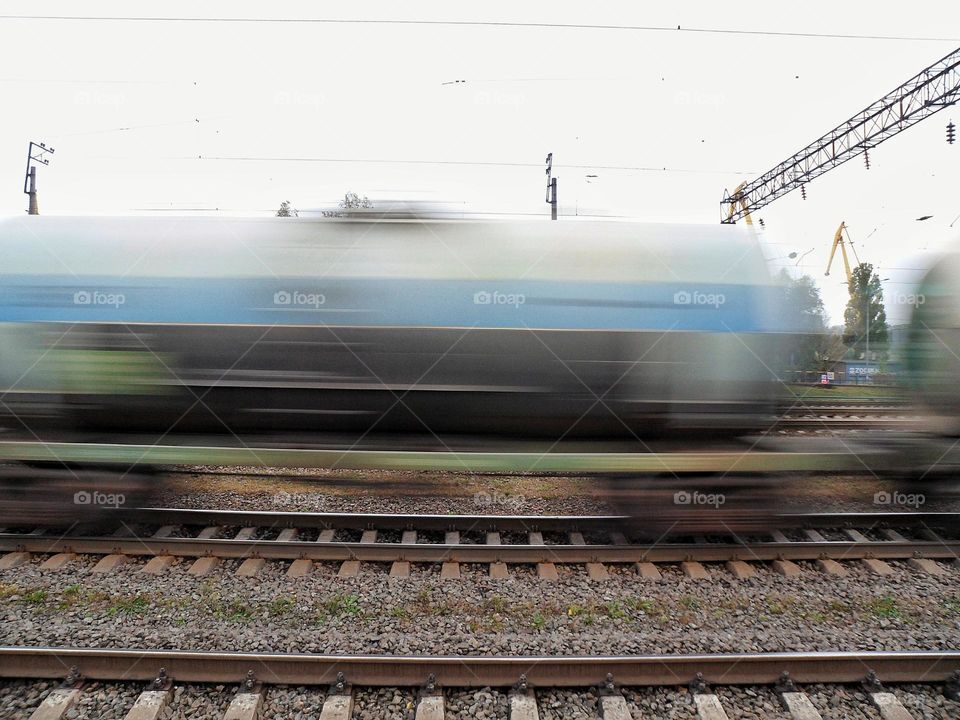 blurred train cars in motion