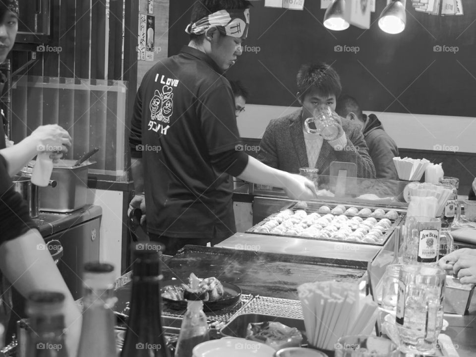 Japanese chef in black and white.
