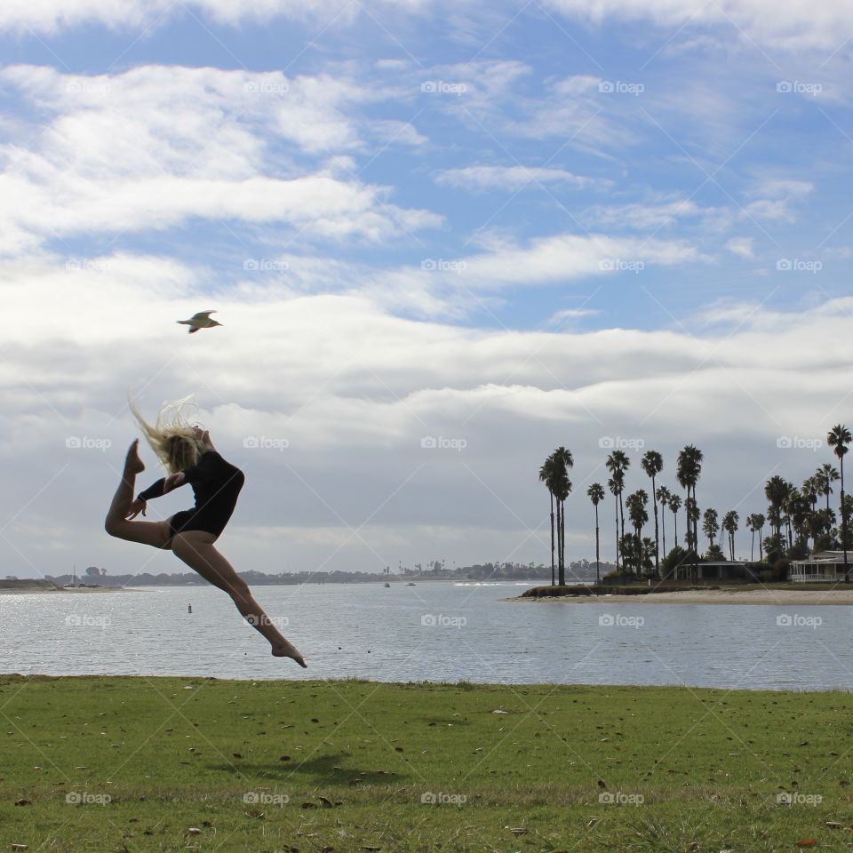 “Your wings already exist, all you have to do is fly.” Young dancer flys next to seagull in San Diego, CA. Talk about PERFECT TIMING! 