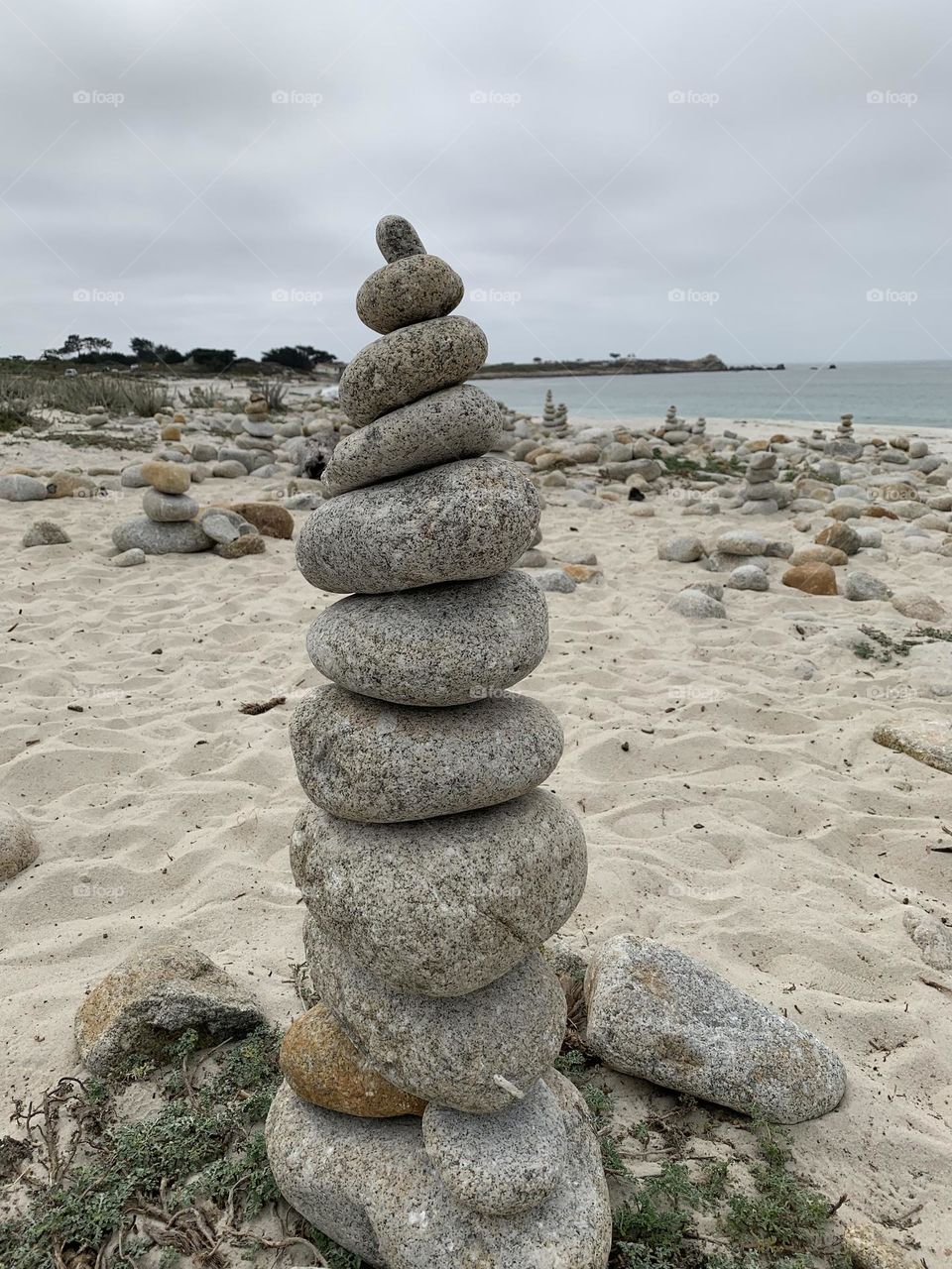 Stacking stones on top of each other is known as rock balancing or stone cairns, and it is also known as land art. These balancing rock piles or stone sculptures are not held together by any adhesives or supports.