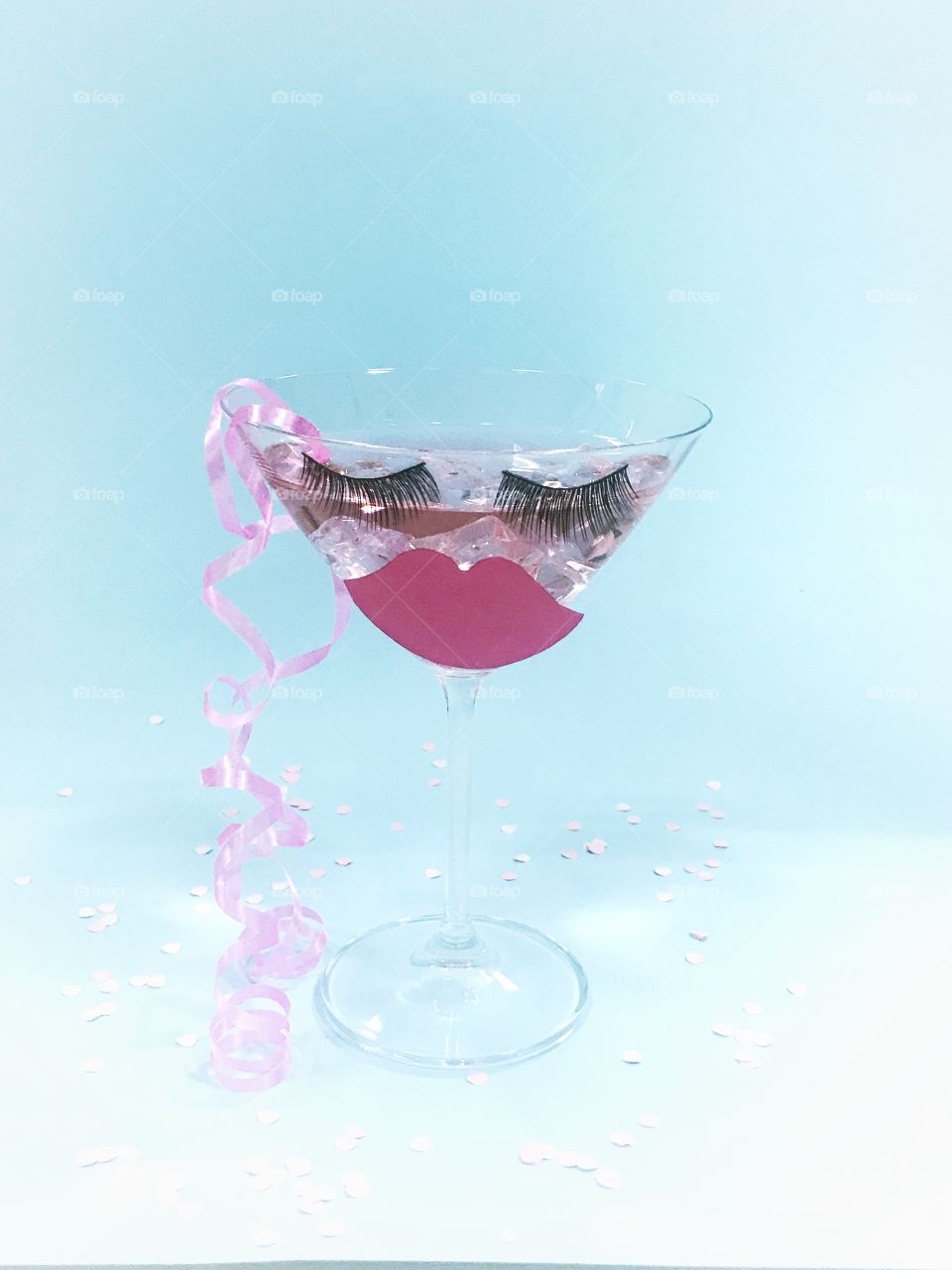 Creative photo concept. Cocktail glass with lips