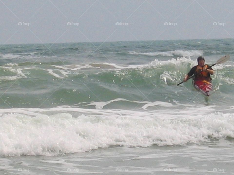 Kayak surfing