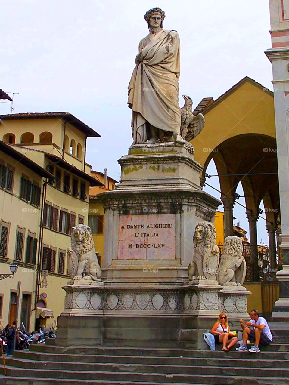 Memorial and sculpture of Dante Alighieri in Florence Italy next to the church of Santa Croce