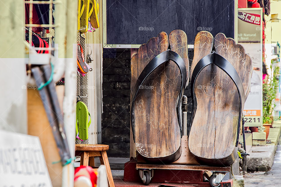 Close-up of wooden flip-flops