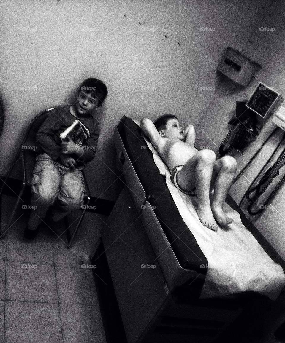 Boys in a hospital examination room