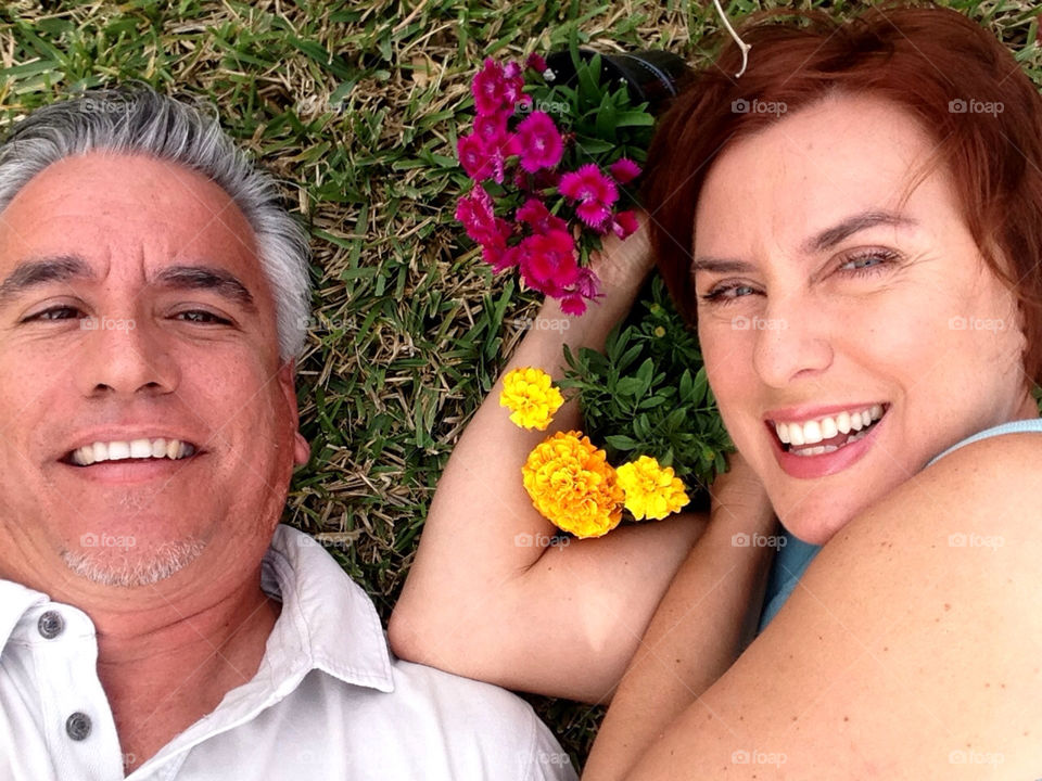 Couple with flowers in garden