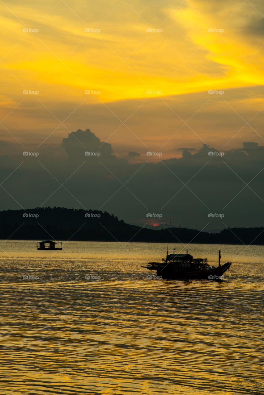 boat and fisherman