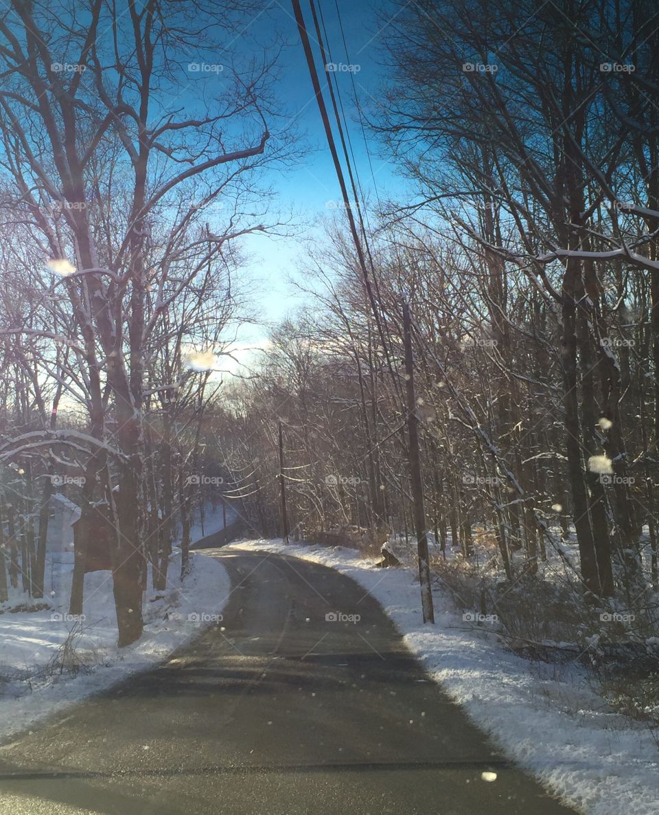 Snowy road down the street 