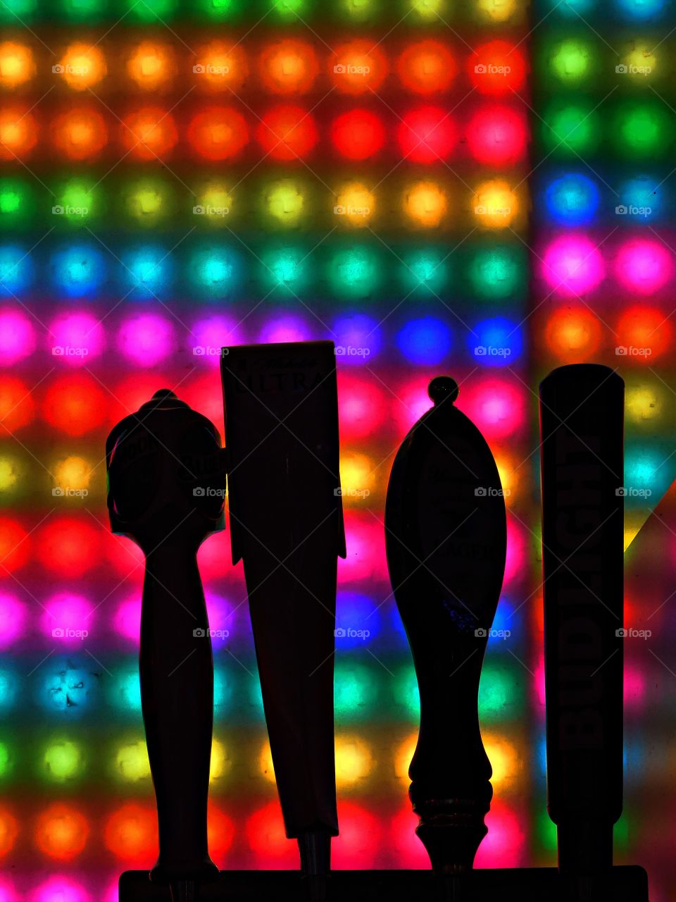 Liquids - Silhouettes of beer taps at the ready position to serve thirty customers their favorite beer