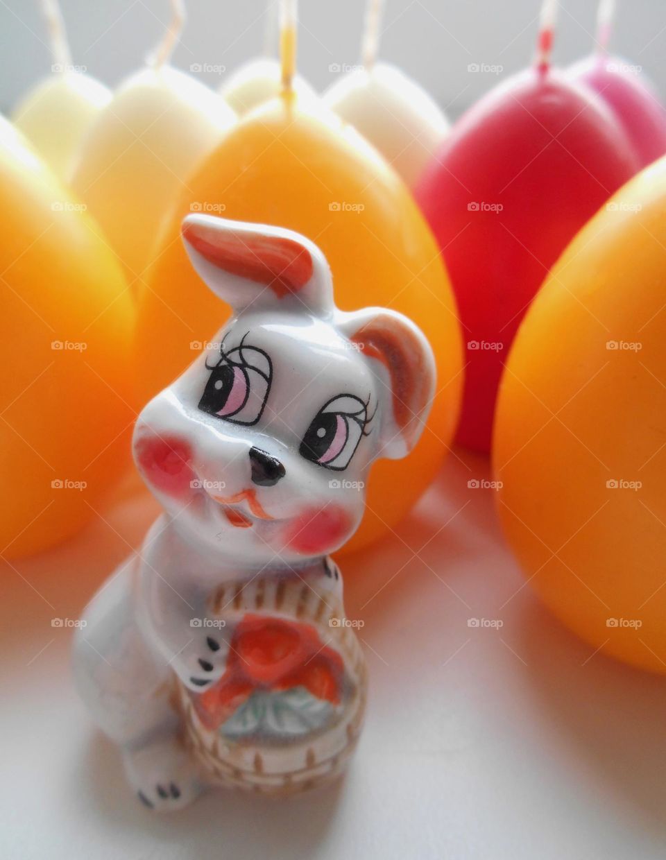 decorative rabbit souvenirs and colour eggs spring holiday, symbol New Year