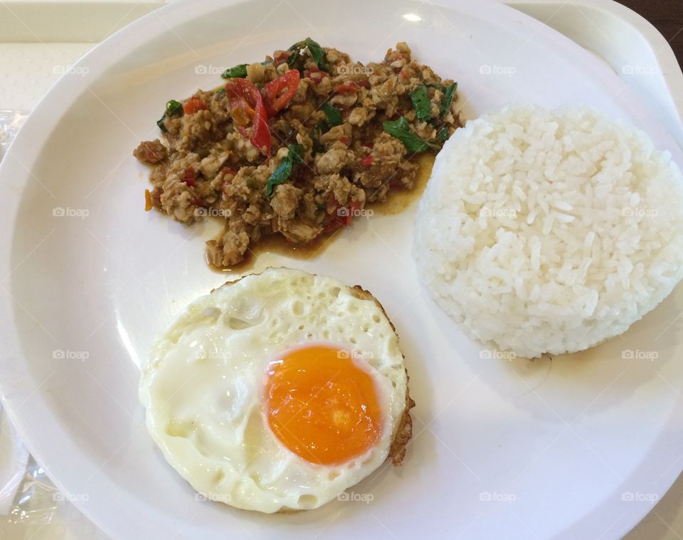 Rice chicken basil fried egg, Thai food