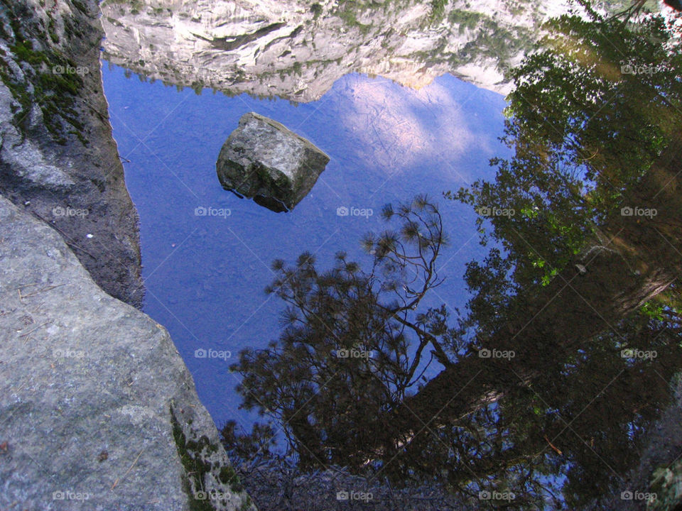 ROCK FLOATING IN LAKE