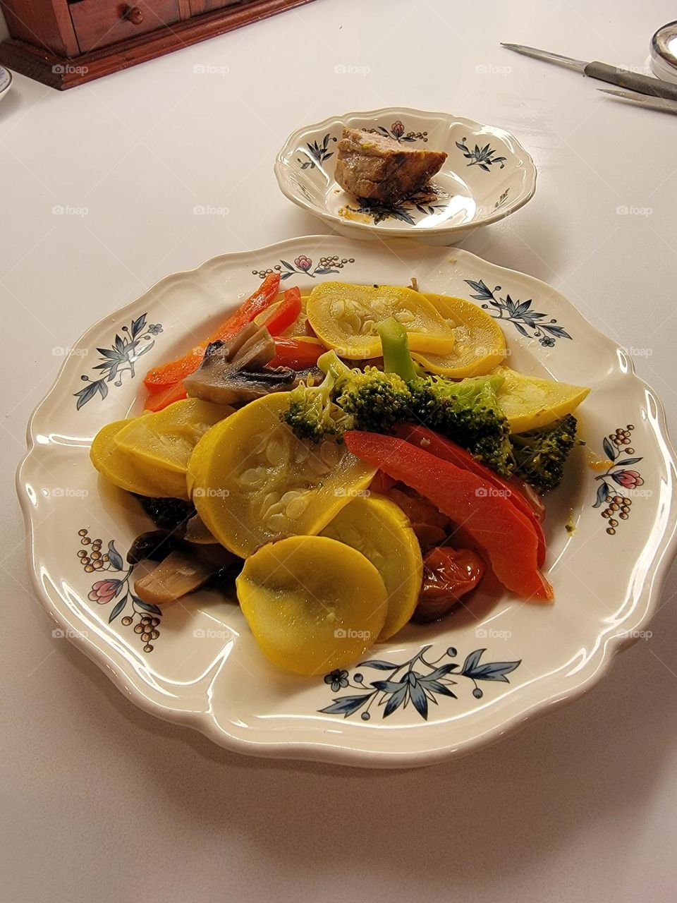 Colorful fresh sauteed vegetables in a splash of olive oil. Seasoned with salt and pepper and a dab of butter