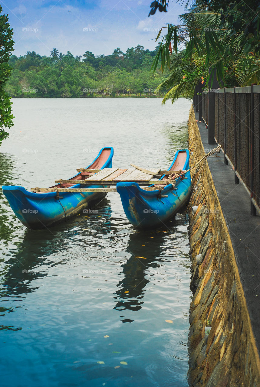 Blue boat on Sri Lanka lake 