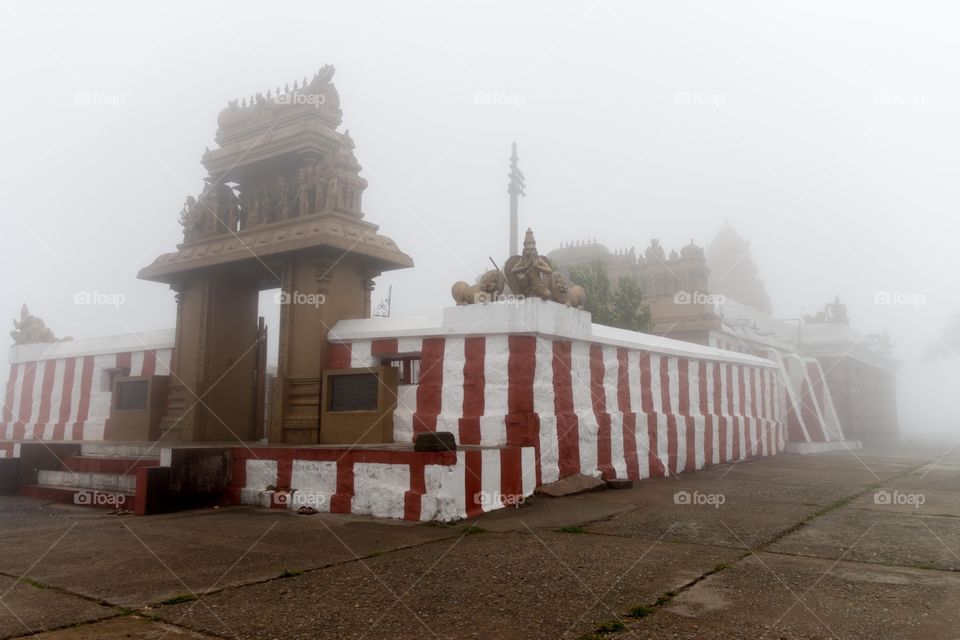 misty temple on a hill top.