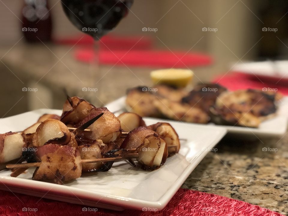 Clams casino, scallops wrapped with bacon & wine