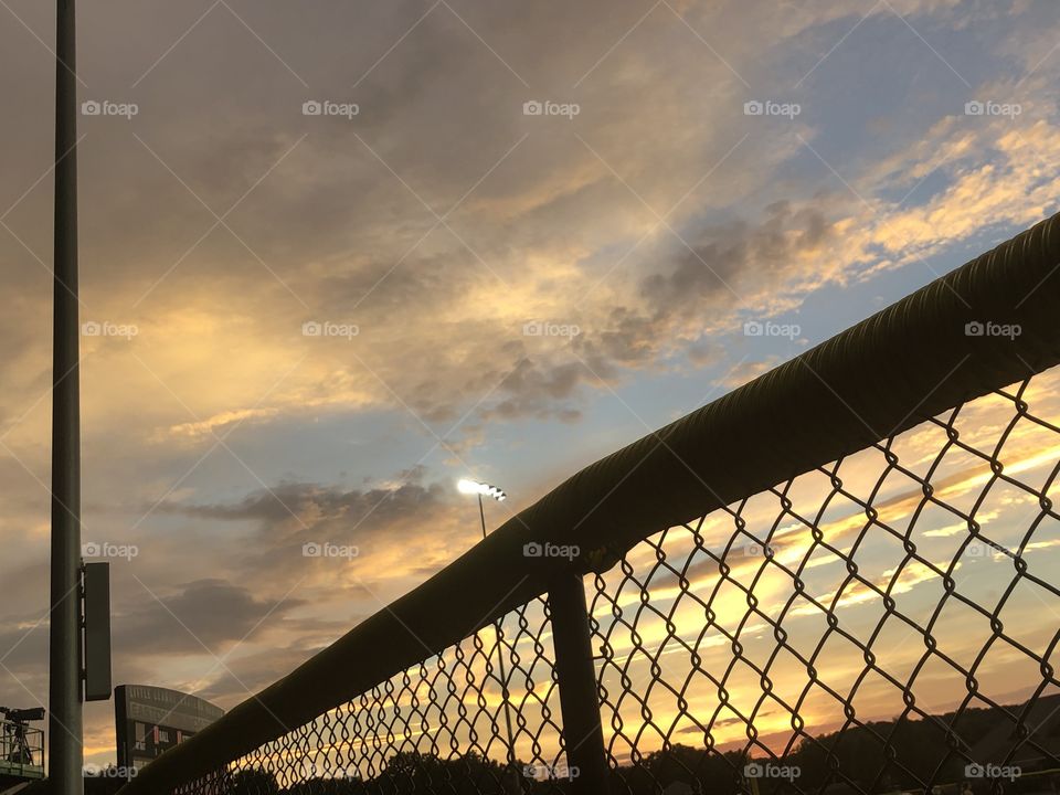 Pretty sky with baseball field