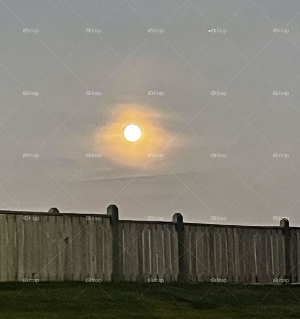 Hazy skies full moon