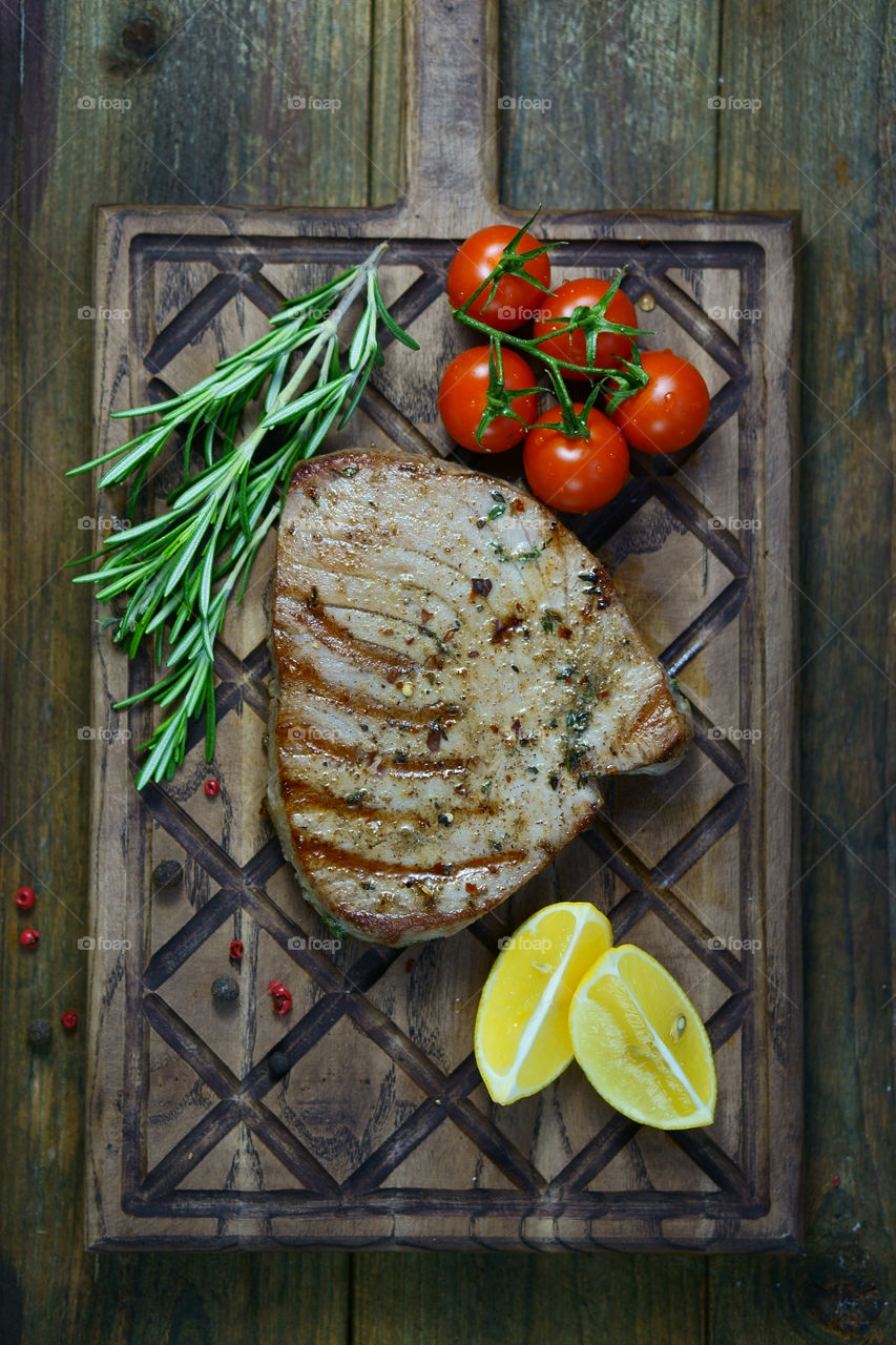 Tuna steak on cutting board