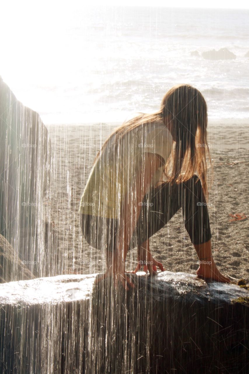 Behind the waterfall