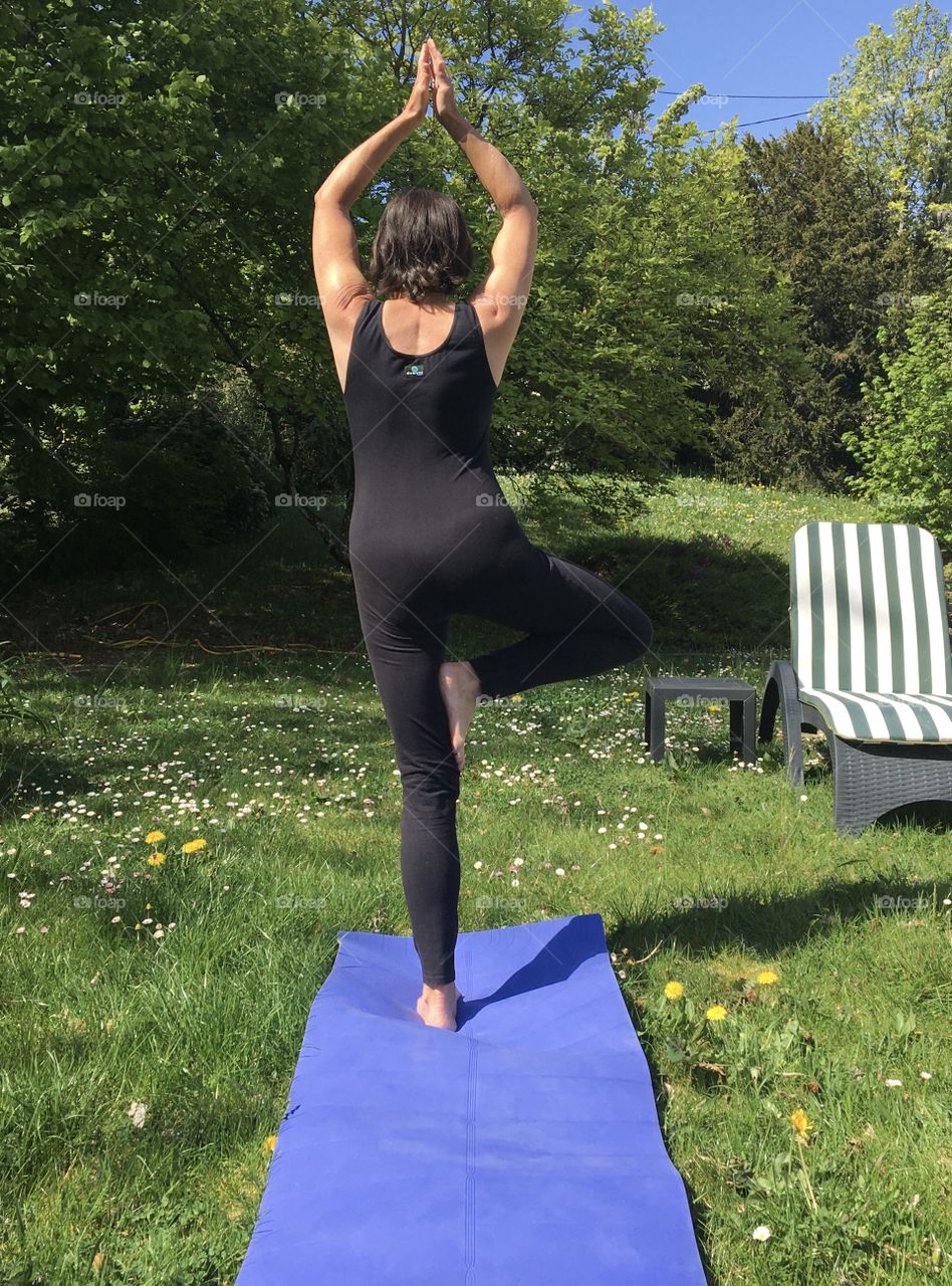 Outdoors yoga in garden during first COVID quarantine 